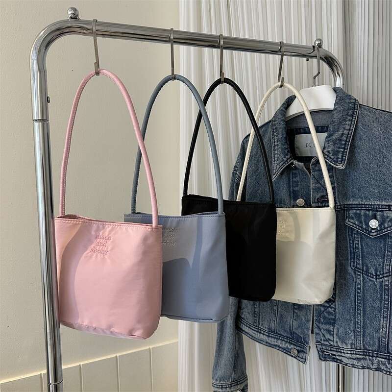Korean mucu and ebony fashionable embroidered high elastic waterproof nylon versatile casual underarm shoulder bag for women