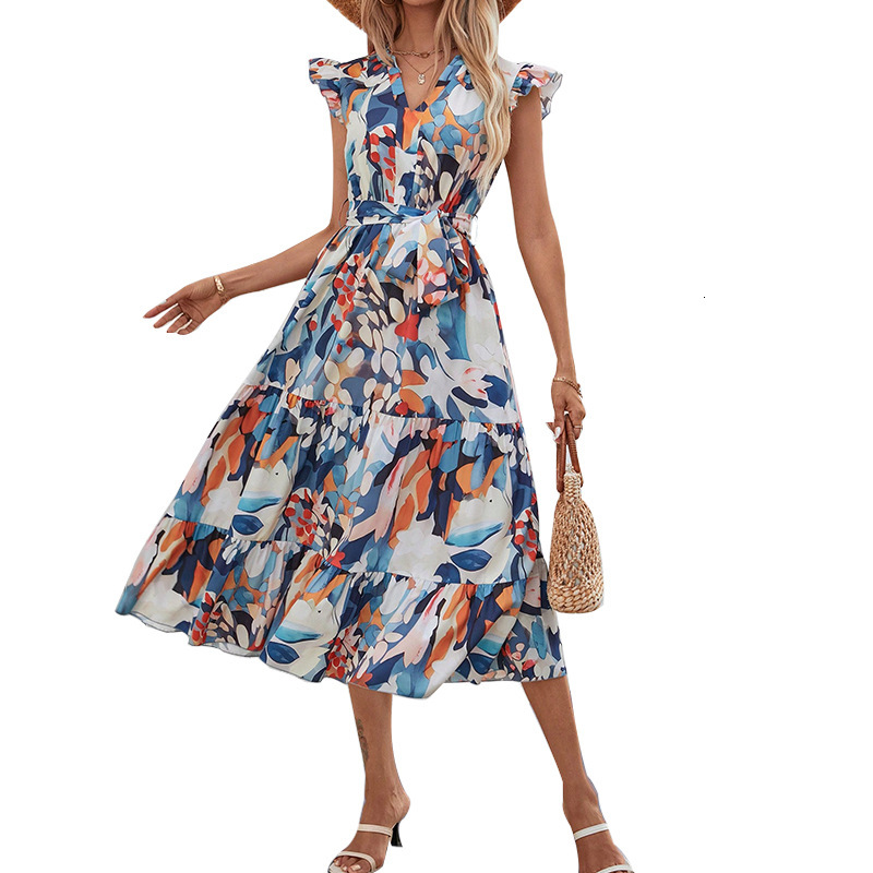 Bohemian vacation style dress 2025 summer lace sleeves cinched waist A-line mid length skirt