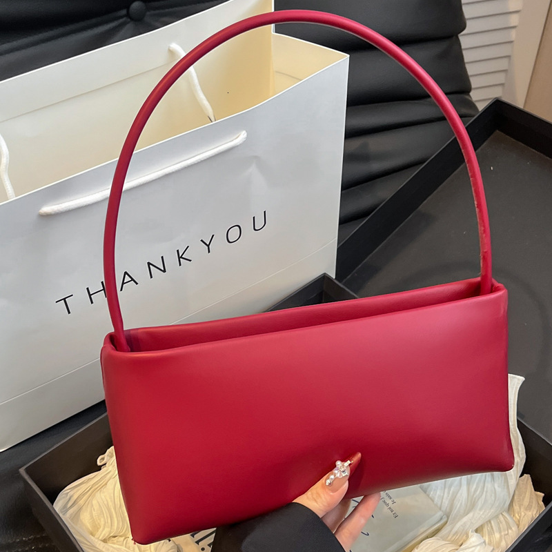 2025S Designer Women S Bag Advanced Style Armpit French Minimalist Niche Design Hand Held Solid Color Small Square Bag Trendy Single Shoulder Crossbod