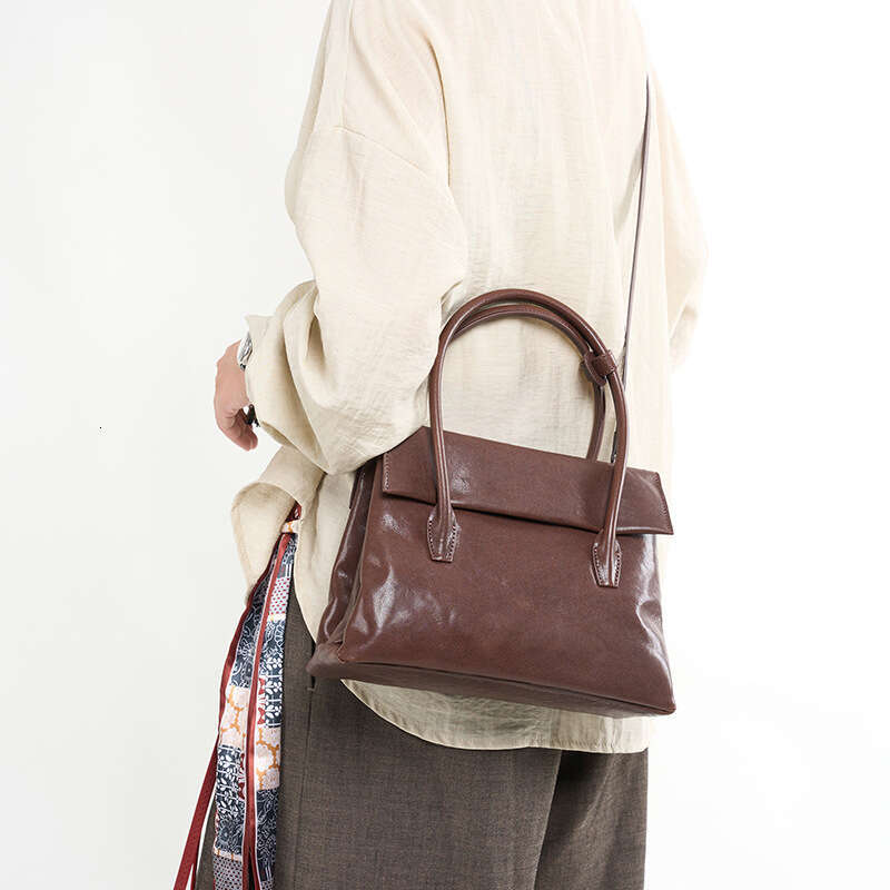Luxury Bags Designer Fashion m Niche Brand Autumn & Winter Fashion Top Handle Bags New Genuine Leather Vegetable Tanned Cowhide One Shoulder Cross-bod
