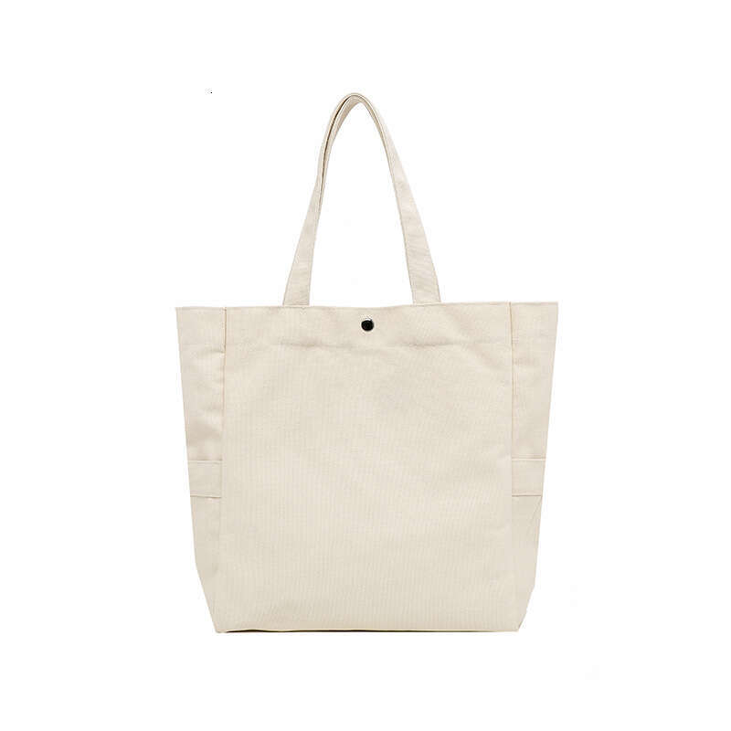 Canvas Korean version artistic solid color large capacity single shoulder tote for versatile work ins women's commuting bag