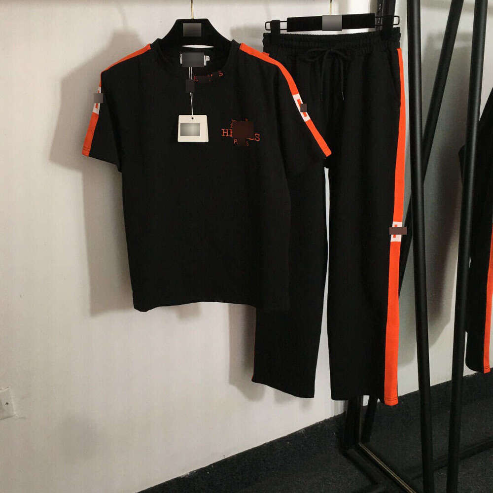 25 new summer Nanyou sports suit with embroidered carriage on the chest, short sleeved T-shirt and woven edge casual pants