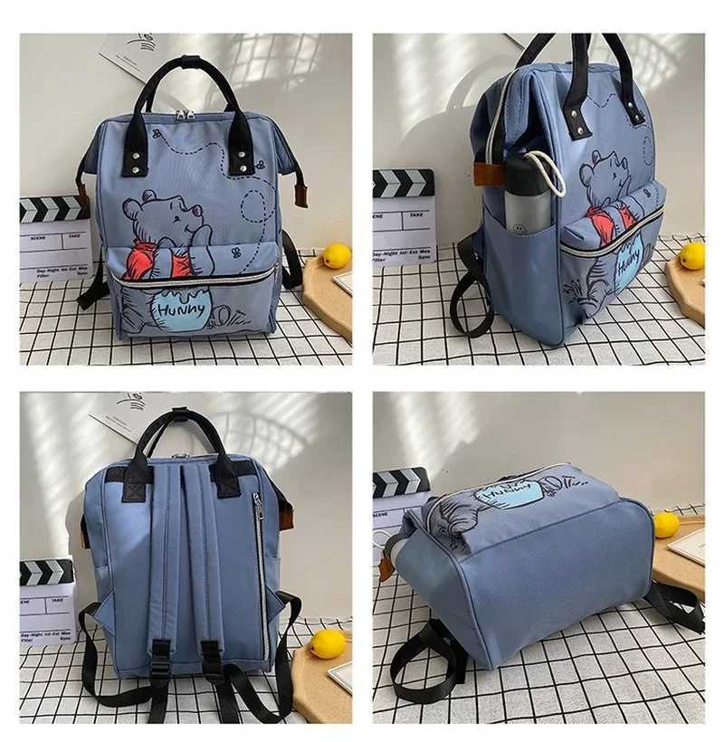 Disney 2025 New Disney Winnie The Pooh Diaper Bag Backpack Cartoon Cute Mother and Baby Bag Large Capacity Lightweight Travel Mommy BagXJ250412