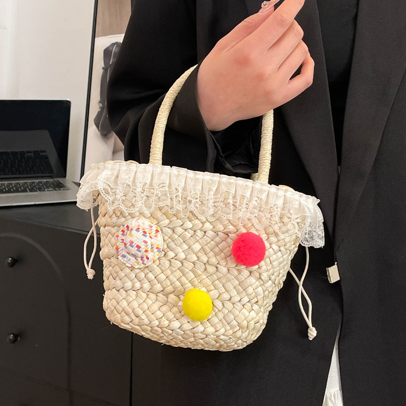 2025S Designer Women S Bag Summer New Straw Woven For Women With High Beauty Kitty Lightweight Handheld Women S Bag Cute Pendant Bow Weaving