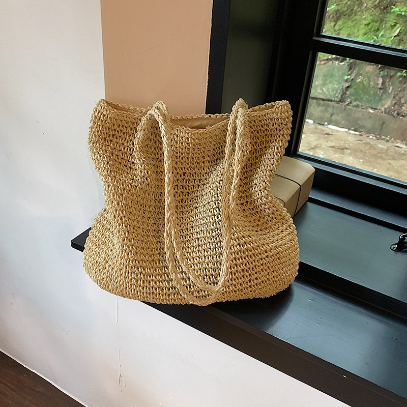 2025S Designer Women S Bag Holiday Large Capacity Fashionable Niche Shoulder New Women S Trend Simple Grass Woven Tote Bag