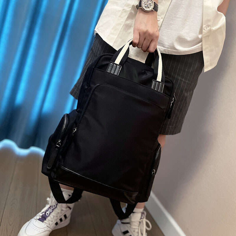 Backpack Japanese and Korean Trendy Multi functional Men's Waterproof Oxford Spinning Large Capacity Travel Backpack Business Bag