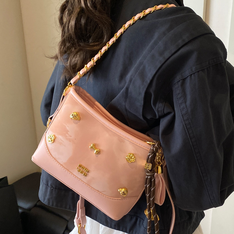 2025S Designer Women S Bag Niche Design Bow Shoulder High End Minimalist Crossbody Bag Fresh Girl Armpit Bucket Bag