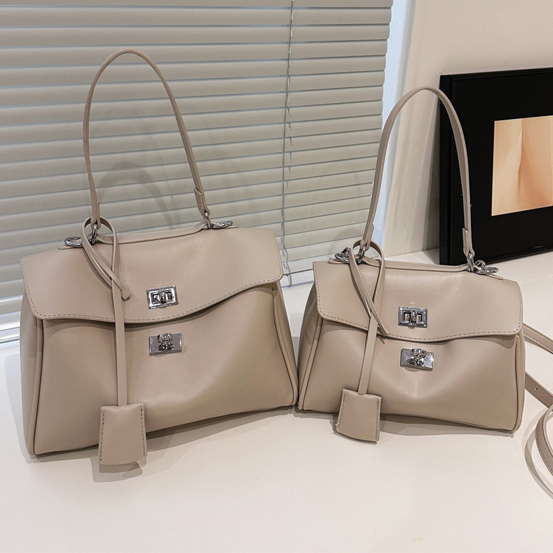 2025S Designer Women S Bag Advanced Texture Kelly Simple Shoulder New Tote Women S Large Capacity Commuter Fashion Underarm Bag