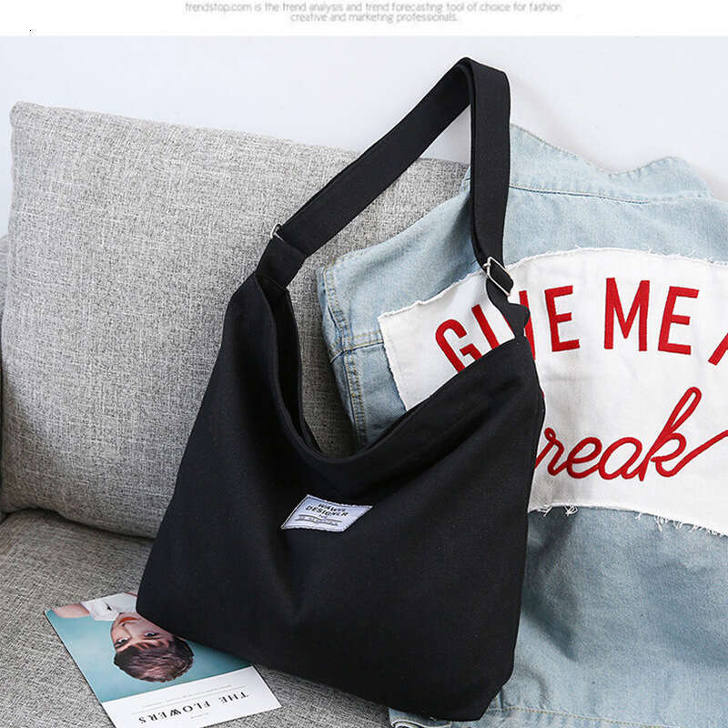 2025New Women's Big Korean Style Letter One Shoulder School Handheld Large Capacity Canvas Bag