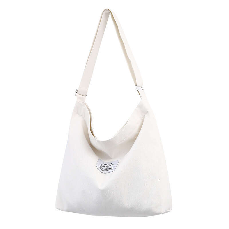 2025New Women's Big Korean Style Letter One Shoulder School Handheld Large Capacity Canvas Bag