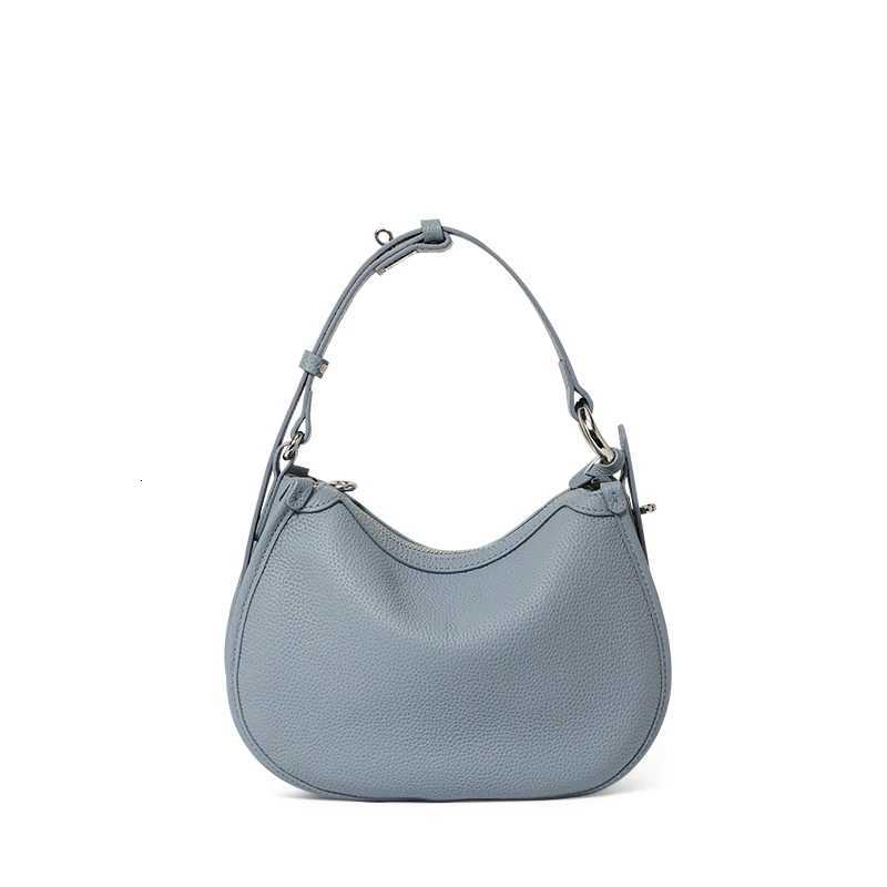 The first layer of cowhide underarm shoulder bag 2025 new niche design minimalist blue fashion soft leather hand saddle bagW251112