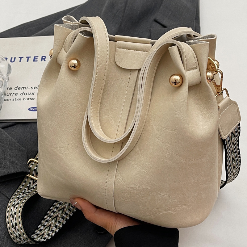 2025S Designer Women S Bag Fashionable And Simple Large Capacity Handbag For Women New Texture Bucket Bag Wide Strap Single Shoulder Crossbody Bag