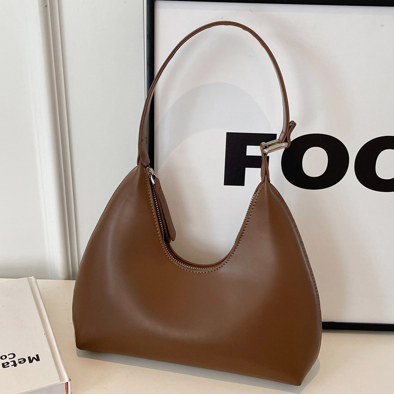 2025S Designer Women S Bag Underarm Women S New Simple Crescent Temperament Versatile Casual Travel Hand Held Texture Shoulder Bag