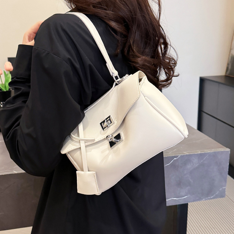 2025S Designer Women S Bag Advanced Texture Kelly Simple Shoulder New Tote Women S Large Capacity Commuter Fashion Underarm Bag