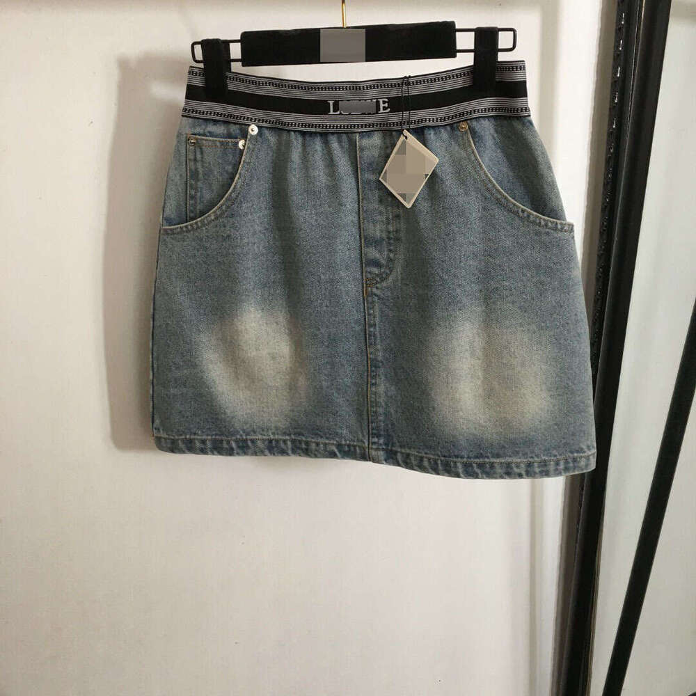 Designer clothing 2025 New Hot Selling Fashionable Embroidered Patchwork Ribbon Versatile Elastic Waist A-line Cowboy Short Half Skirt