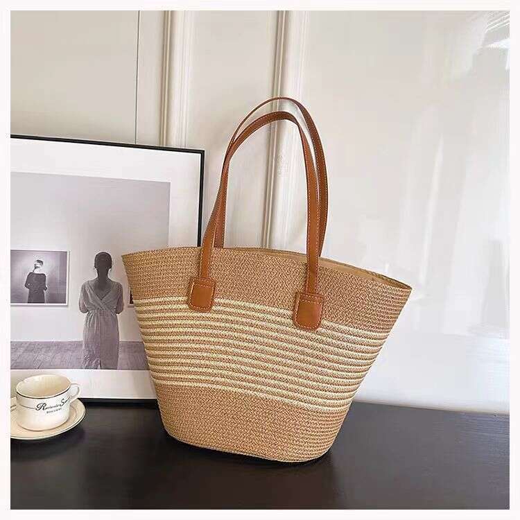 Women's ins new simple and fashionable grass woven large capacity armpit single shoulder hollow weave beach bag for women