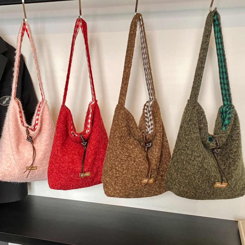 2025S Designer Women S Bag Winter Plush Bucket With Large Capacity Casual And Lazy Style Tote Fashionable Women S Bag Work Commuting Shoulder Bag