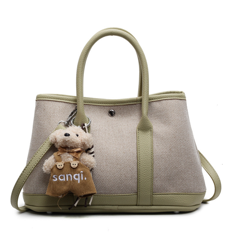 2025S Designer Women S Bag New Fashionable Handheld Bucket For Women In Spring Forest Cute Versatile Canvas Mother And Child Bag Popular Crossbody Bag