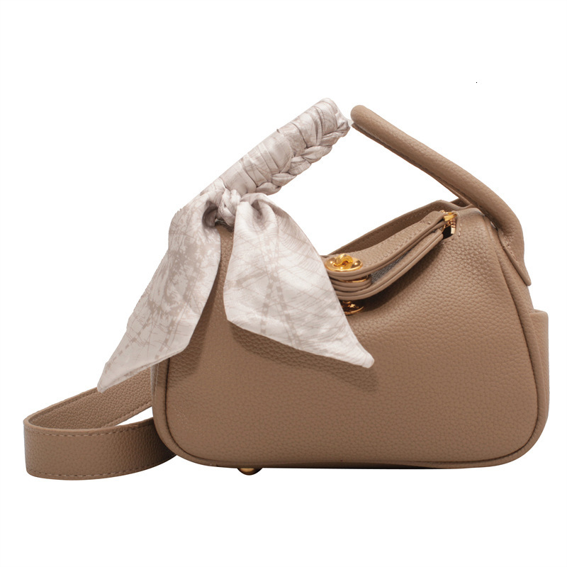 2025S Designer Women S Bag High End Crossbody Textured Hand Held Small Bag New Popular Versatile And Stylish Women S Shoulder Bag