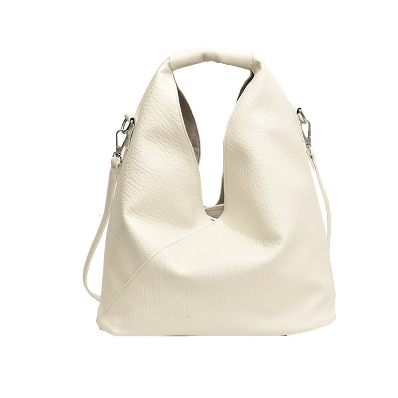 2025S Designer Women S Bag Leisure Commuting Shoulder Autumn Fashion Versatile Crossbody Women S Bag Internet Famous Same Style Hand Held Solid Color 