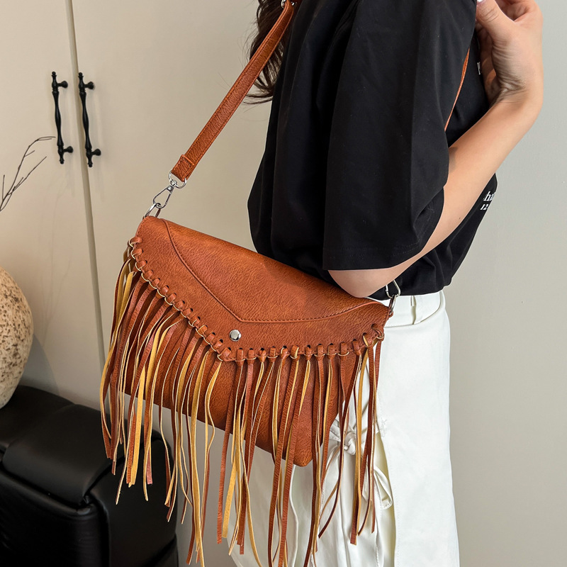 2025S Designer Women S Bag Small Niche Design For Women New Fashionable Tassel Mailman Summer Versatile Wax Leather Crossbody Women S Bag