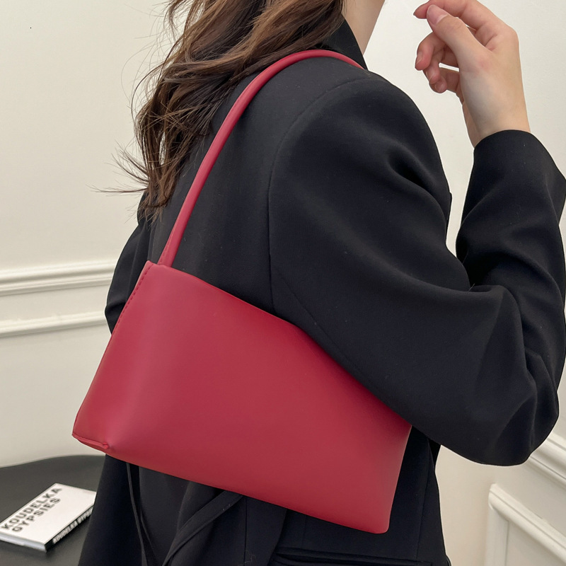 2025S Designer Women S Bag Advanced Style Armpit French Minimalist Niche Design Hand Held Solid Color Small Square Bag Trendy Single Shoulder Crossbod