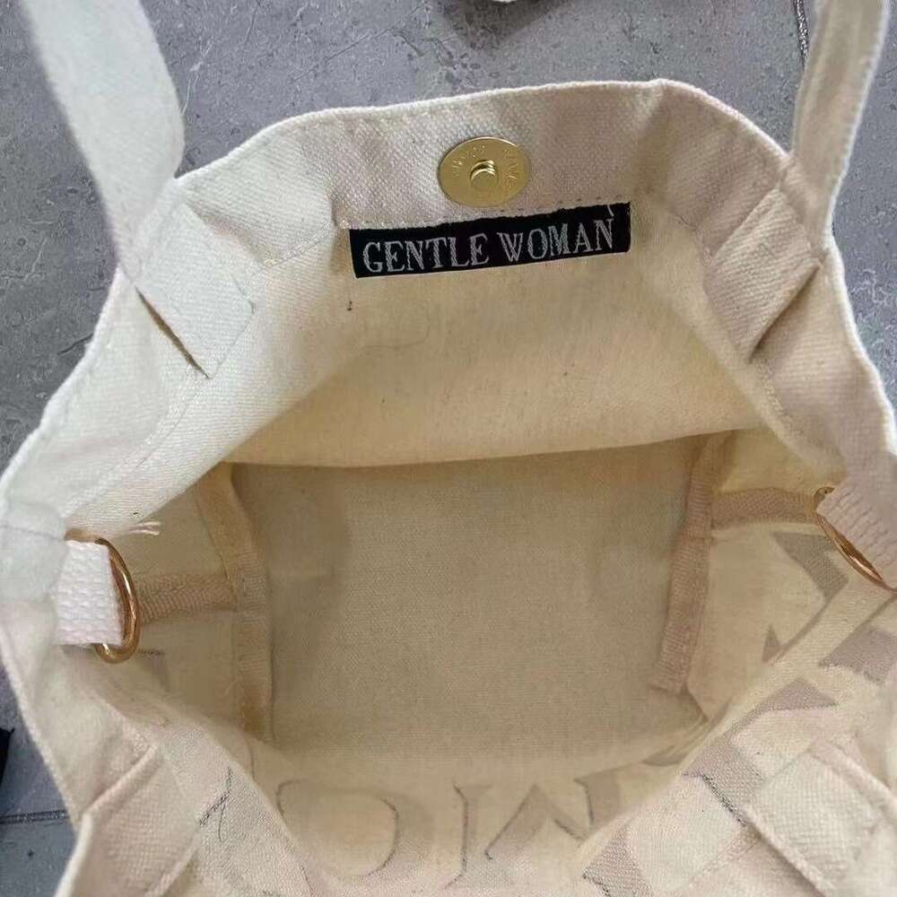 INS trendy crossbody artistic casual single shoulder hand-held dual-use letter canvas shopping bag