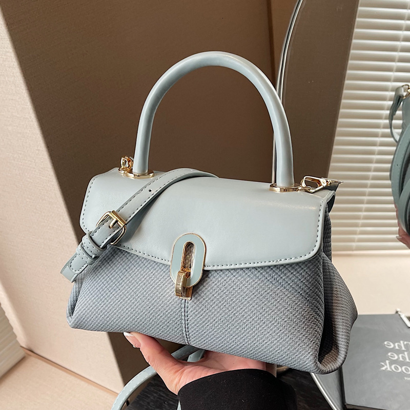 2025S Designer Women S Bag Texture Handheld New Women S Lychee Pattern Small Room Versatile Simple Single Shoulder Crossbody Bag