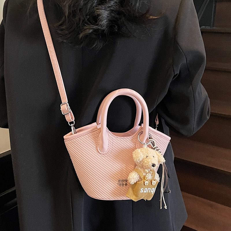 2025S Designer Niche Design Single Shoulder Women S Spring And Summer Color Contrasting Crossbody Urban Minimalist Handheld High hot End Water Bucket 