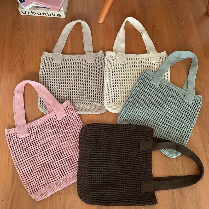 Summer niche versatile knitted simple woven mesh hollowed out women's shoulder bag, tote handbag