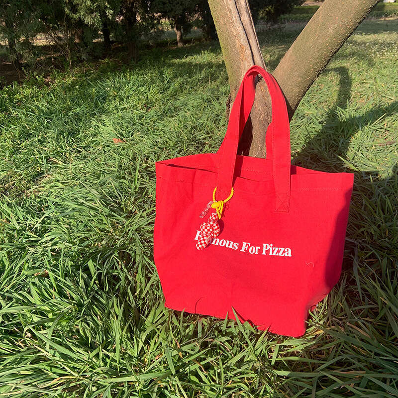 Red canvas large capacity single shoulder handbag, school commuting bag, minimalist cloth bag