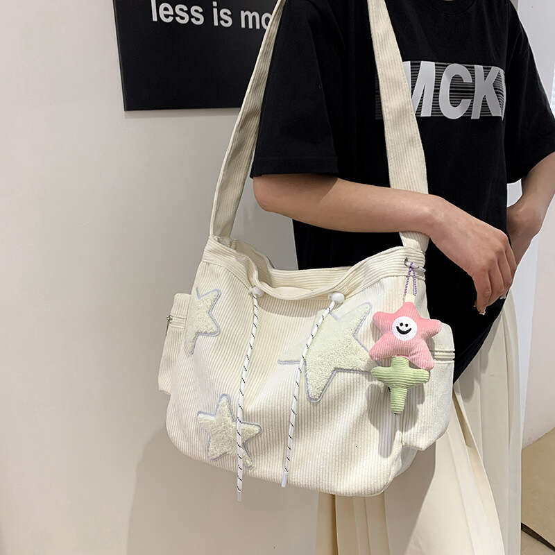 Large capacity corduroy women's single shoulder with high-end feeling, five pointed star crossbody cute student tote bag factory batch