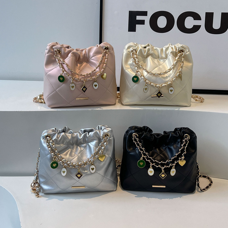 Designer Women S Texture Drawstring Crossbody Summer New Product Fashionable Dia Minimalist Handbag Chain Shiny Single Shoulder Bucket Bag Free Shippi