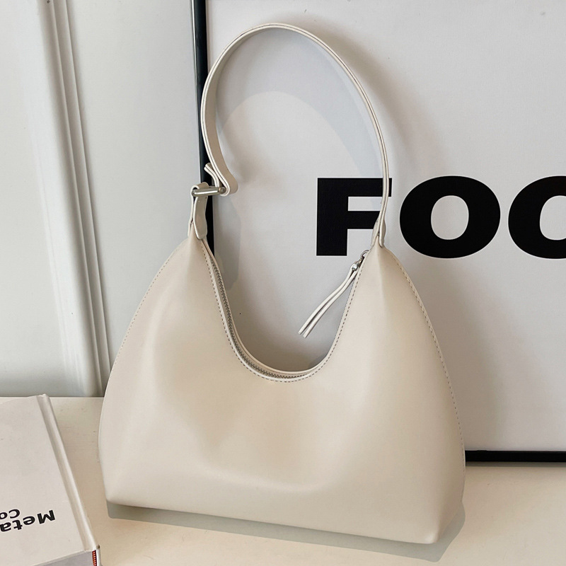 2025S Designer Women S Bag Underarm Women S New Simple Crescent Temperament Versatile Casual Travel Hand Held Texture Shoulder Bag