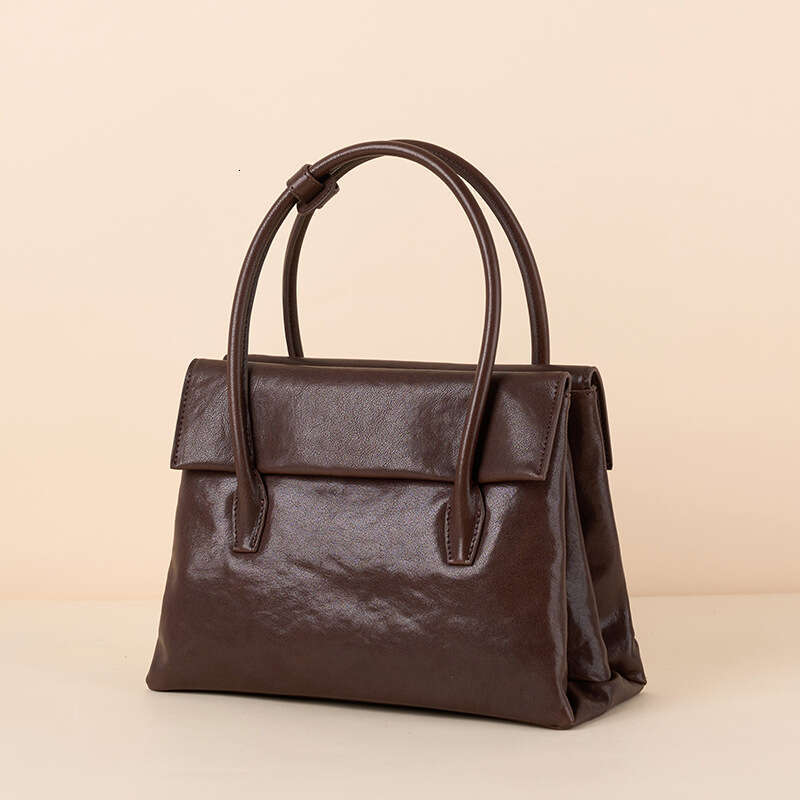 Luxury Bags Designer Fashion m Niche Brand Autumn & Winter Fashion Top Handle Bags New Genuine Leather Vegetable Tanned Cowhide One Shoulder Cross-bod