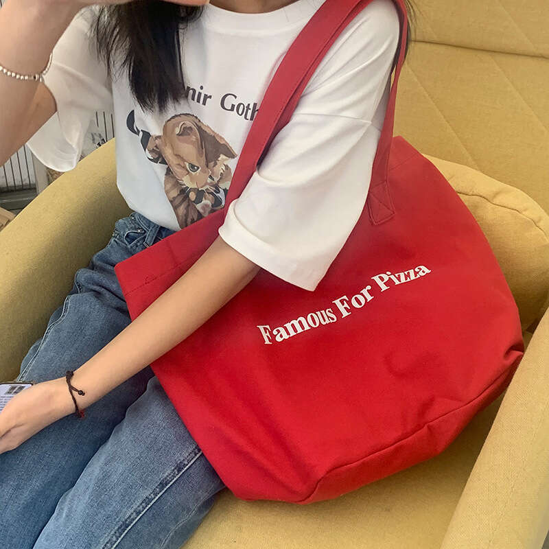 Red canvas large capacity single shoulder handbag, school commuting bag, minimalist cloth bag