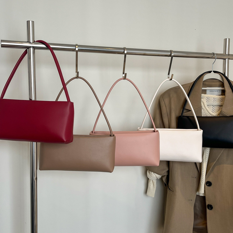 2025S Designer Women S Bag Advanced Style Armpit French Minimalist Niche Design Hand Held Solid Color Small Square Bag Trendy Single Shoulder Crossbod