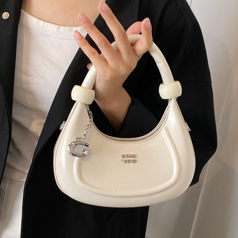 2025S Designer Women S Bag Minimally Designed Armpit Casual Crescent Shaped Bag Women S New Trendy And Fashionable Commuting High Quality Handbag