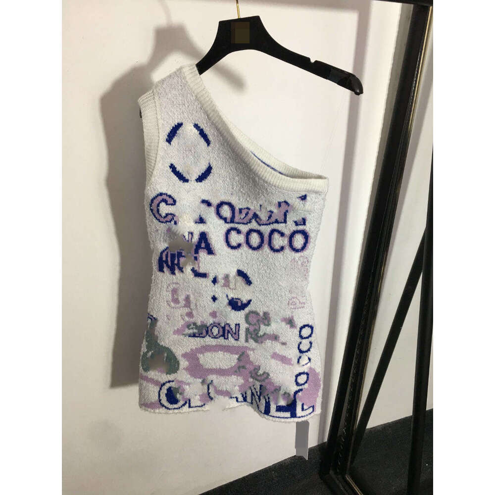 25 Autumn/Winter Nanyou New Set with Letter Printed V-neck Long Sleeve Knitted Cardigan+Diagonal Shoulder Dress