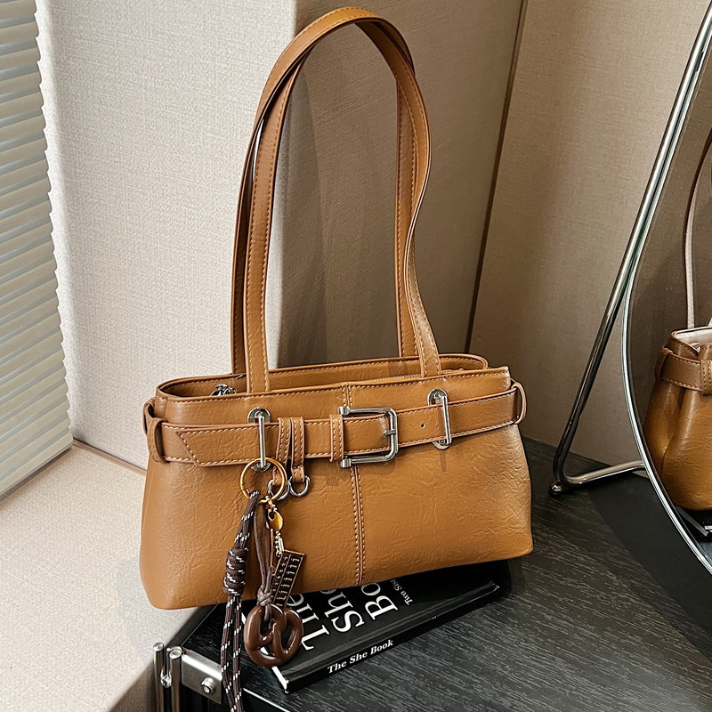 2025S Designer Women S Bag Small Korean Style Armpit Women S Commuting Belt Buckle Bag Fashionable And Stylish Shoulder Strap Tote Bag