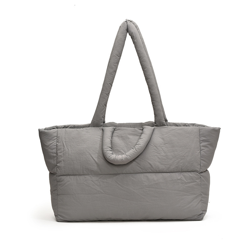 2025S Designer Women S Bag Women S New Cotton Down Jackets Niche South Korean Space Bags One Shoulder Tote Oversized Bags Popular This Year