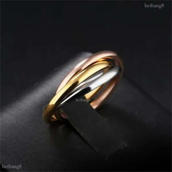 Fashion Classic Creative Trinity Three Ring Winding Ring Women's Stainless Steel 3 Color Rolling Wedding Band Rings