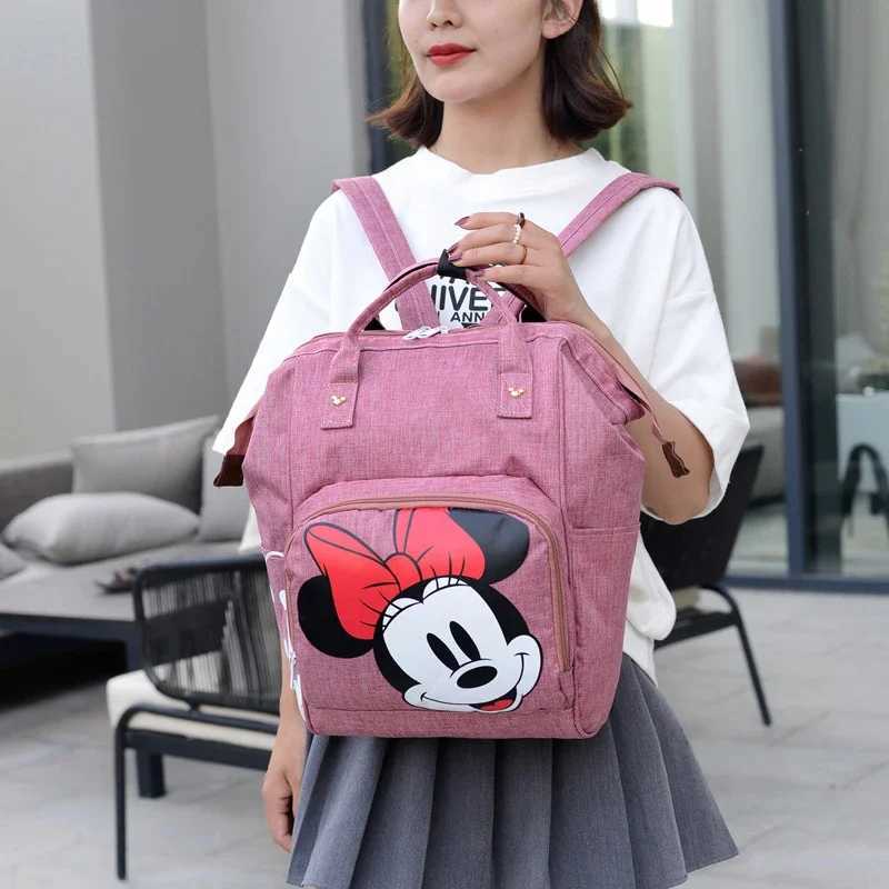 Disneyminis new dial bag backpack cartoon cute mother and baby bag large capacity multifunctional fashionable outdoor baby bagXJ250412