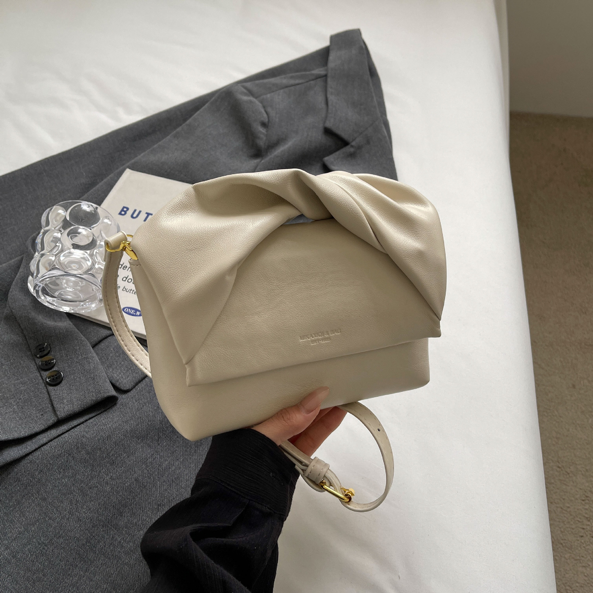 2025S Designer Women S Bag Fashionable Small Square Simple Atmospheric Texture Armpit Shoulder Bag Daily Pairing With Trendy And Niche Solid Color Cro