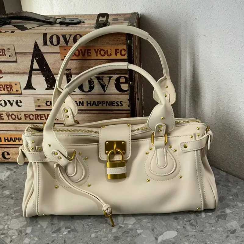 Brand Rivet Womens Tote Bag Creative Lock Key Design Shoulder Crossbody Bag European American Trendy Motorcycle Style Women BagW251112