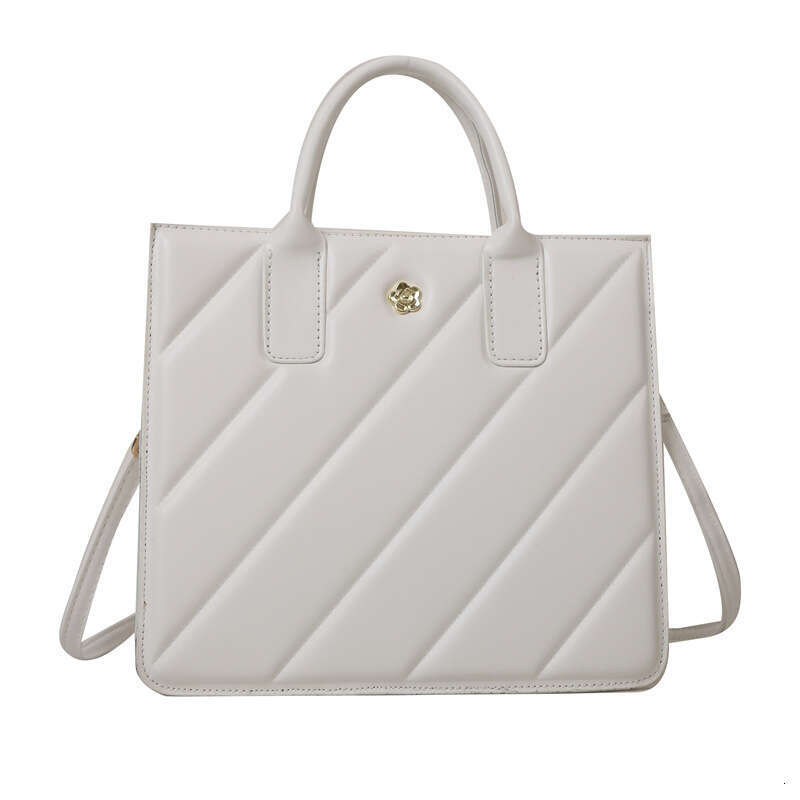 Fashionable high-end shoulder solid color niche handbag, commuting and outdoor crossbody bag, large capacity