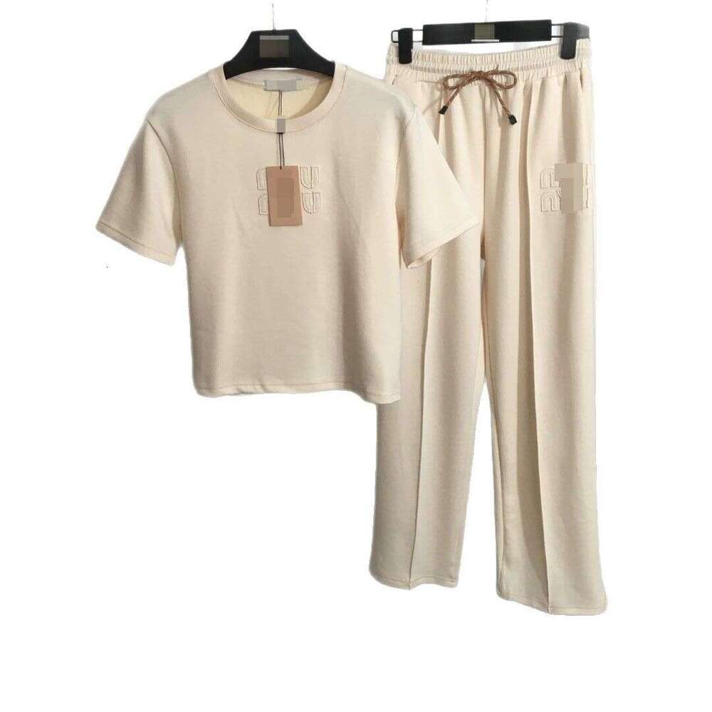 Designer clothing 25 New Nanyou Sports Set Fashion Embroidered Letter Patch Short Sleeve T-shirt+Elastic Waist Casual Straight Pants