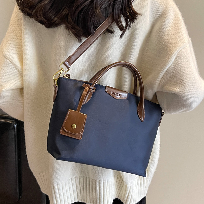 2025S Designer Women S Bag Oxford Cloth Lightweight And Practical Crossbody New Versatile Shoulder With High End Feel Hand Held Tote Bag For Women