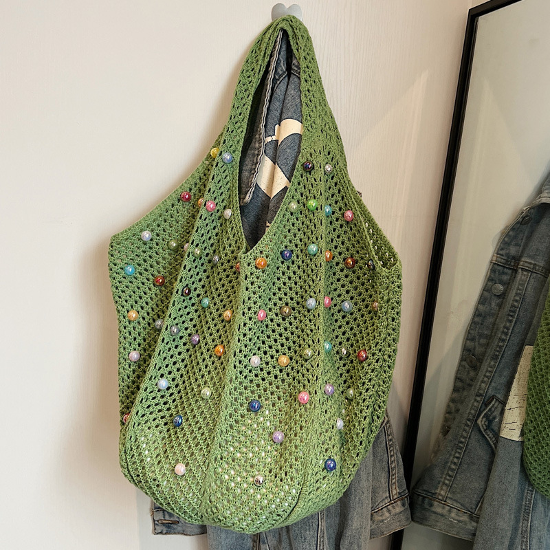 2025S Designer Women S Bag Knitted Handbag Handheld Women S Japanese Handwoven Hollow Casual One Shoulder Tank Top Large Capacity Crossbody Bag