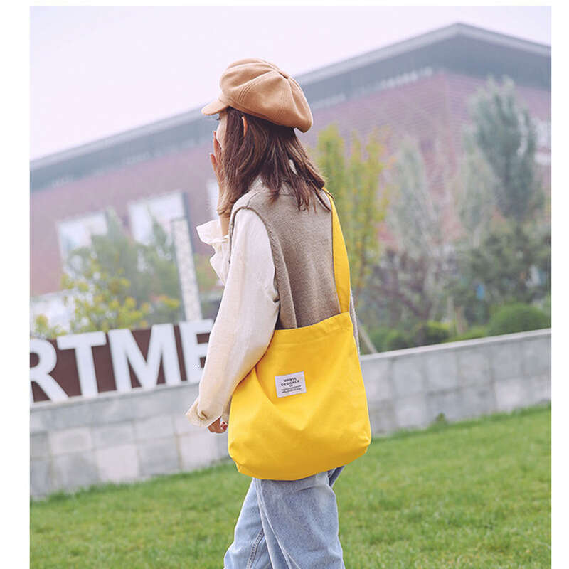 2025New Women's Big Korean Style Letter One Shoulder School Handheld Large Capacity Canvas Bag